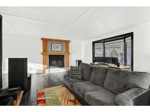 10102 89 Street, Grande Prairie, AB - Indoor Photo Showing Living Room With Fireplace