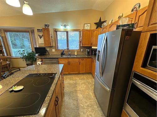 7129 99A Street, Peace River, AB - Indoor Photo Showing Kitchen With Double Sink