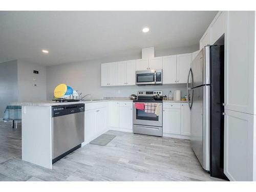 C-9524 113 Avenue, Clairmont, AB - Indoor Photo Showing Kitchen With Stainless Steel Kitchen