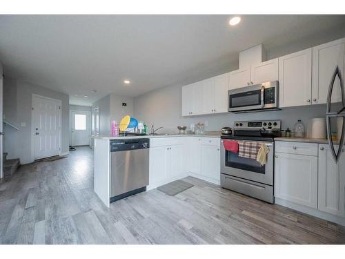 C-9524 113 Avenue, Clairmont, AB - Indoor Photo Showing Kitchen With Stainless Steel Kitchen