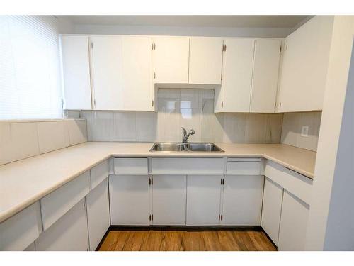 10511 102 Avenue, Grande Prairie, AB - Indoor Photo Showing Kitchen With Double Sink