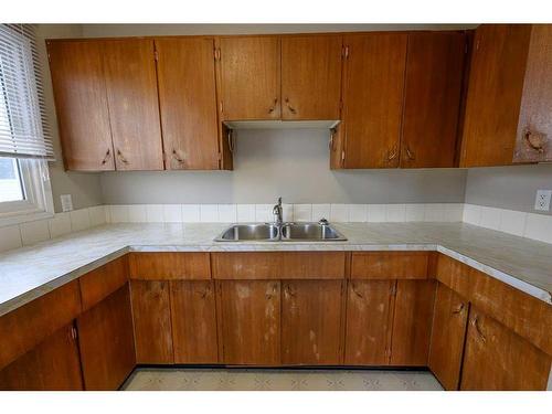 10511 102 Avenue, Grande Prairie, AB - Indoor Photo Showing Kitchen With Double Sink