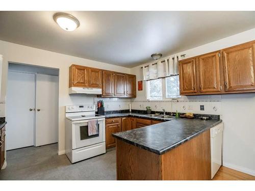 5313 50 Ave, Grimshaw, AB - Indoor Photo Showing Kitchen With Double Sink