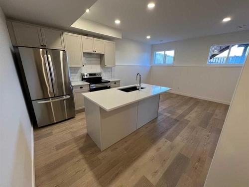 208-11850 84 Avenue, Grande Prairie, AB - Indoor Photo Showing Kitchen With Double Sink