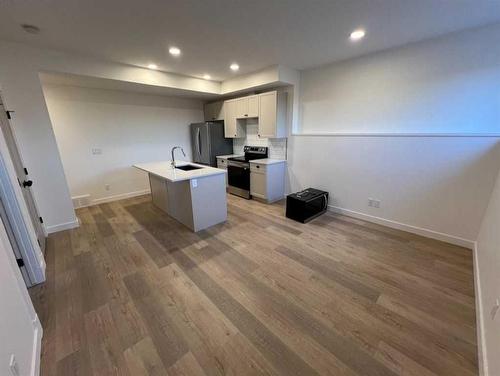 208-11850 84 Avenue, Grande Prairie, AB - Indoor Photo Showing Kitchen