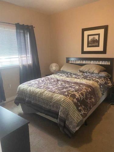 404-9221 Lakeland Drive, Grande Prairie, AB - Indoor Photo Showing Bedroom