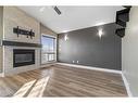 8625 62 Avenue, Grande Prairie, AB  - Indoor Photo Showing Living Room With Fireplace 