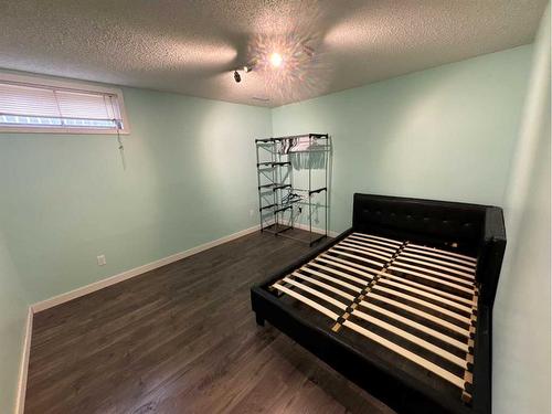 7719 95 Street, Grande Prairie, AB - Indoor Photo Showing Bedroom