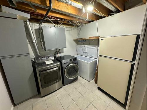 7719 95 Street, Grande Prairie, AB - Indoor Photo Showing Laundry Room