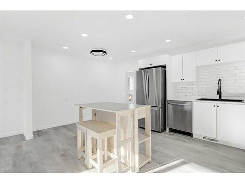 9702 77 Avenue, Grande Prairie, AB - Indoor Photo Showing Kitchen With Upgraded Kitchen