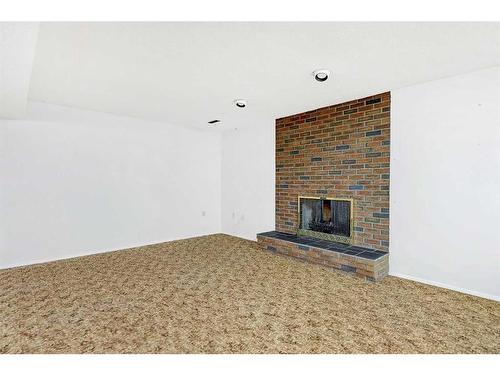 9514 77 Avenue, Grande Prairie, AB - Indoor With Fireplace