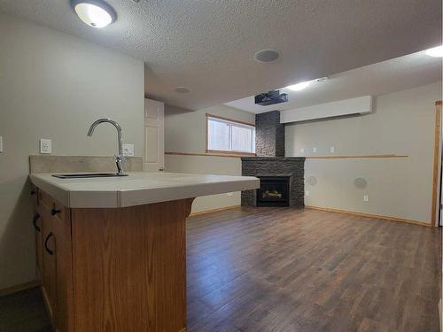 9441 90A Street, Grande Prairie, AB - Indoor With Fireplace