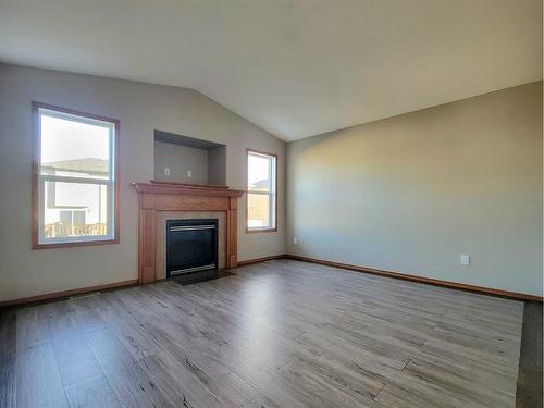 9441 90A Street, Grande Prairie, AB - Indoor Photo Showing Living Room With Fireplace