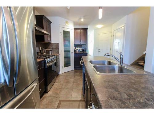 7417 112 Street, Grande Prairie, AB - Indoor Photo Showing Kitchen With Double Sink