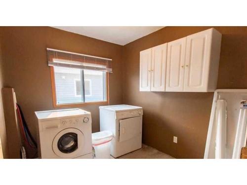 9702 105 Avenue, Clairmont, AB - Indoor Photo Showing Laundry Room