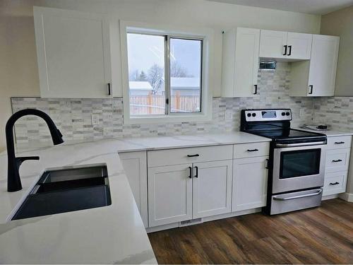 8934 103 Avenue, Grande Prairie, AB - Indoor Photo Showing Kitchen With Upgraded Kitchen