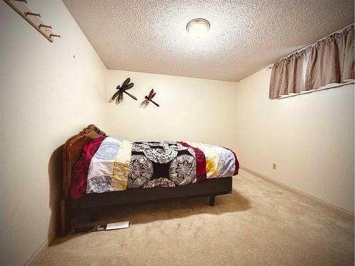 9126 128 Avenue, Peace River, AB - Indoor Photo Showing Bedroom