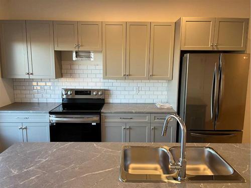 218-11850 84 Avenue, Grande Prairie, AB - Indoor Photo Showing Kitchen With Double Sink