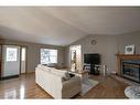 9129 135 Ave, Peace River, AB  - Indoor Photo Showing Living Room With Fireplace 