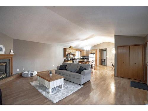 9129 135 Ave, Peace River, AB - Indoor Photo Showing Living Room With Fireplace