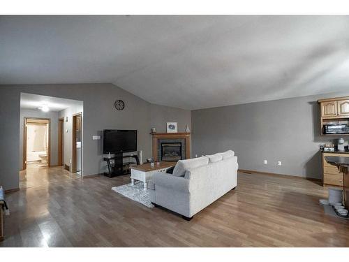 9129 135 Ave, Peace River, AB - Indoor Photo Showing Living Room With Fireplace