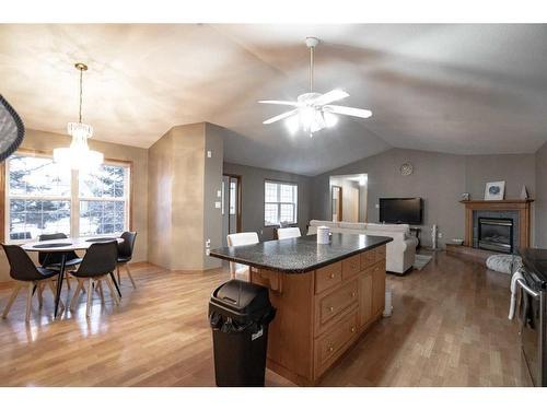 9129 135 Ave, Peace River, AB - Indoor Photo Showing Dining Room With Fireplace