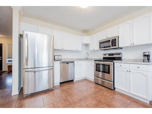 6218 90 Street, Grande Prairie, AB - Indoor Photo Showing Kitchen With Stainless Steel Kitchen