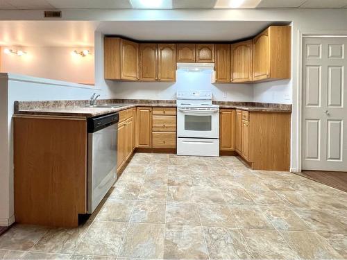 10361 Kateri Drive, Grande Prairie, AB - Indoor Photo Showing Kitchen