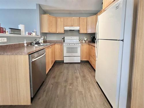 10361 Kateri Drive, Grande Prairie, AB - Indoor Photo Showing Kitchen With Double Sink