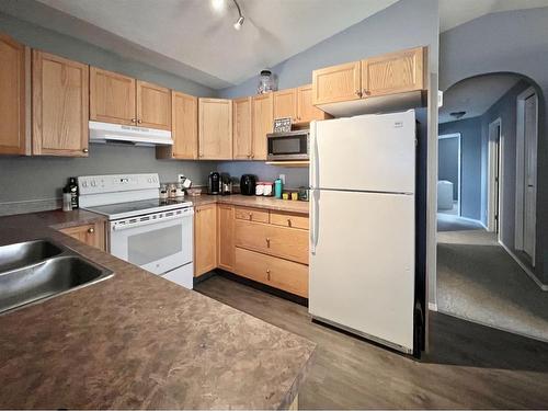 10361 Kateri Drive, Grande Prairie, AB - Indoor Photo Showing Kitchen With Double Sink