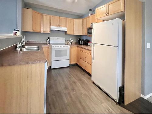 10361 Kateri Drive, Grande Prairie, AB - Indoor Photo Showing Kitchen With Double Sink