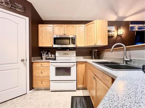 8829 65 Avenue, Grande Prairie, AB - Indoor Photo Showing Kitchen With Double Sink