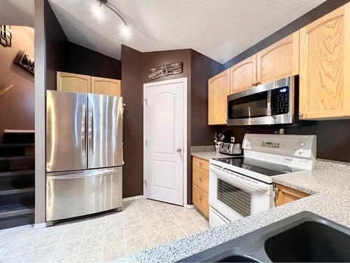 8829 65 Avenue, Grande Prairie, AB - Indoor Photo Showing Kitchen