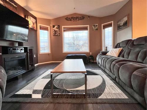 8829 65 Avenue, Grande Prairie, AB - Indoor Photo Showing Living Room With Fireplace