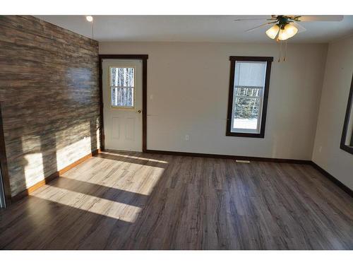 107244 Hwy 697, Rural Mackenzie County, AB - Indoor Photo Showing Other Room With Fireplace