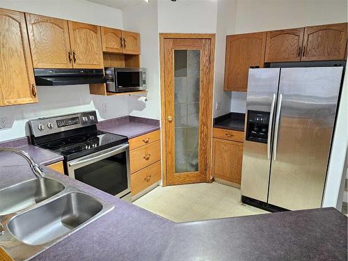 12401 97B Street, Grande Prairie, AB - Indoor Photo Showing Kitchen With Double Sink