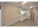 8325 101 Avenue, Peace River, AB  - Indoor Photo Showing Kitchen With Double Sink 