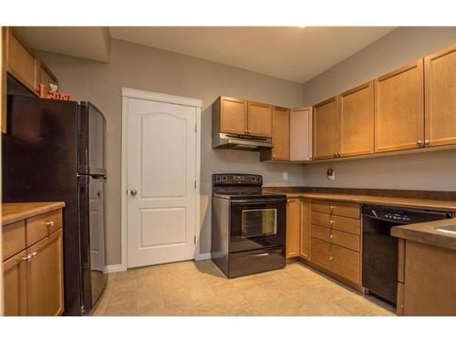 103D-8640 103 Avenue, Grande Prairie, AB - Indoor Photo Showing Kitchen