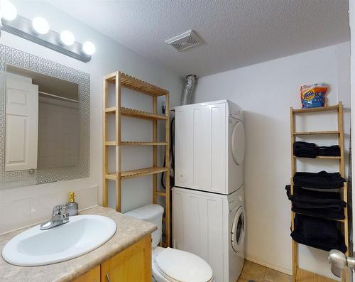 310-11240 104 Avenue, Grande Prairie, AB - Indoor Photo Showing Laundry Room