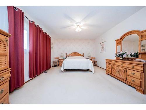 10224 Michaelis Boulevard, Grande Prairie, AB - Indoor Photo Showing Bedroom