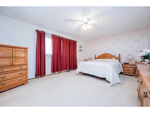 10224 Michaelis Boulevard, Grande Prairie, AB - Indoor Photo Showing Bedroom