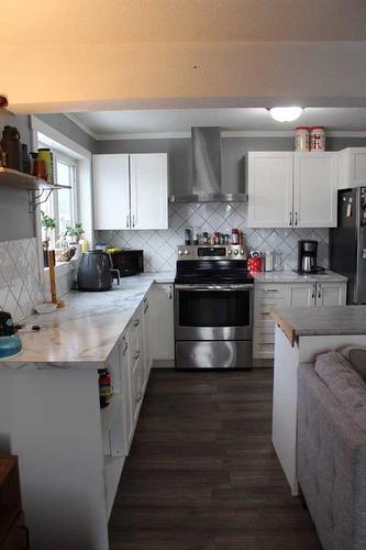 409 2Nd Street Ne, Manning, AB - Indoor Photo Showing Kitchen With Double Sink