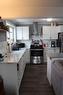 409 2Nd Street Ne, Manning, AB  - Indoor Photo Showing Kitchen With Double Sink 