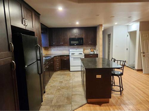 5517  47 High Prairie Street North, High Prairie, AB - Indoor Photo Showing Kitchen