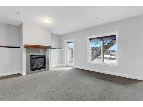 11301 59 Avenue, Grande Prairie, AB - Indoor Photo Showing Living Room With Fireplace