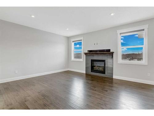 11301 59 Avenue, Grande Prairie, AB - Indoor Photo Showing Living Room With Fireplace