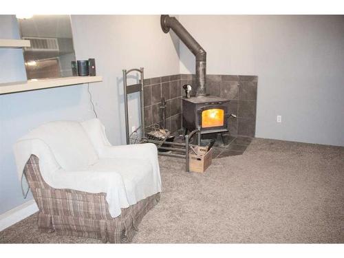 8618 99B Street, Grande Prairie, AB - Indoor With Fireplace