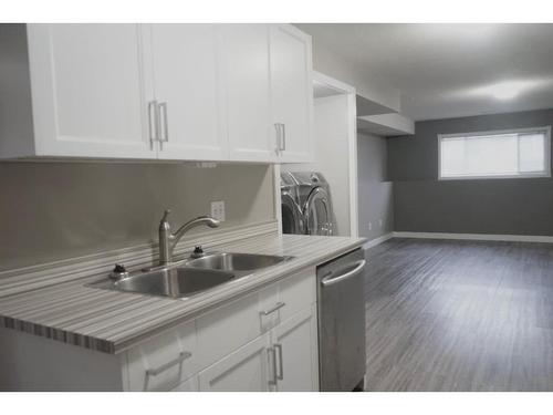 8945 64 Avenue, Grande Prairie, AB - Indoor Photo Showing Kitchen With Double Sink