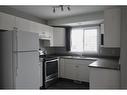 8945 64 Avenue, Grande Prairie, AB  - Indoor Photo Showing Kitchen With Double Sink 