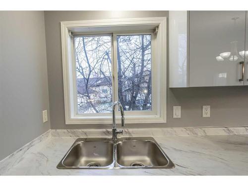 9701 67 Avenue, Grande Prairie, AB - Indoor Photo Showing Kitchen With Double Sink